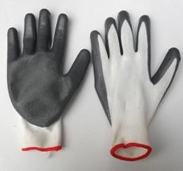 供应东莞十三针尼龙涂胶手套/耐油手套/防油防酸碱耐磨手套图片