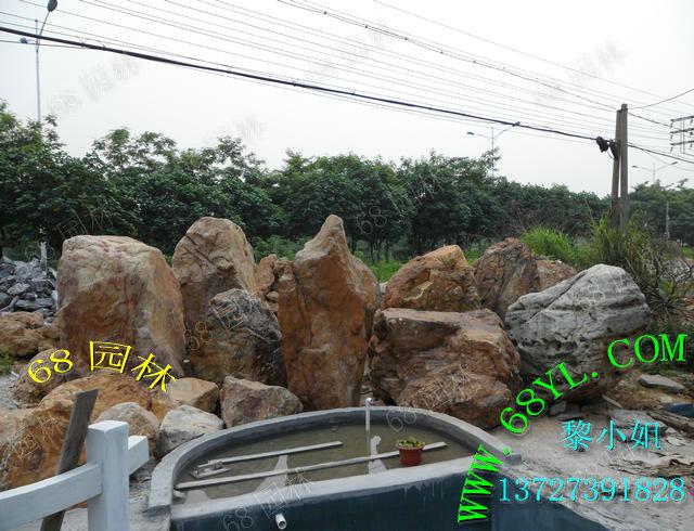 供应大型英腊石销售/黄腊石大石摆景做型/假山石装饰/黄蜡石图片