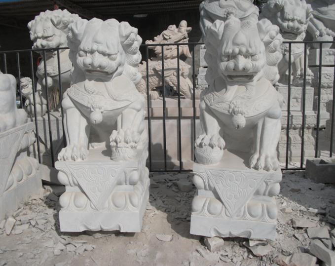 供应许昌市汉白玉石狮雕塑/动物石雕厂家/石头记雕塑公司