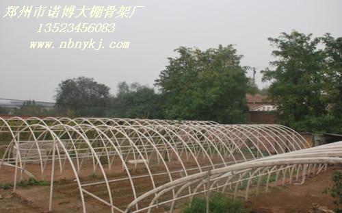 供应郑州玻璃纤维水泥拱圆型大棚骨架-大棚骨架机图片