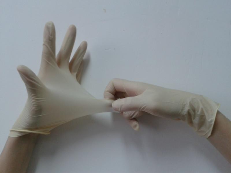 供应最受欢迎的A级100天然一次性净化112寸麻面光面乳胶手套