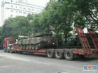 青海拖板车运输特种设备-西宁大件运输挖机13453136199